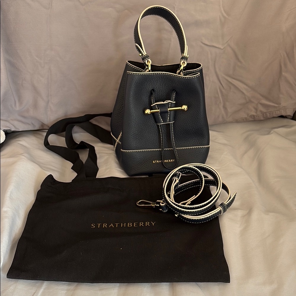 STRATHBERRY Osette leather crossbody shoulder bucket bag in classic blue navy